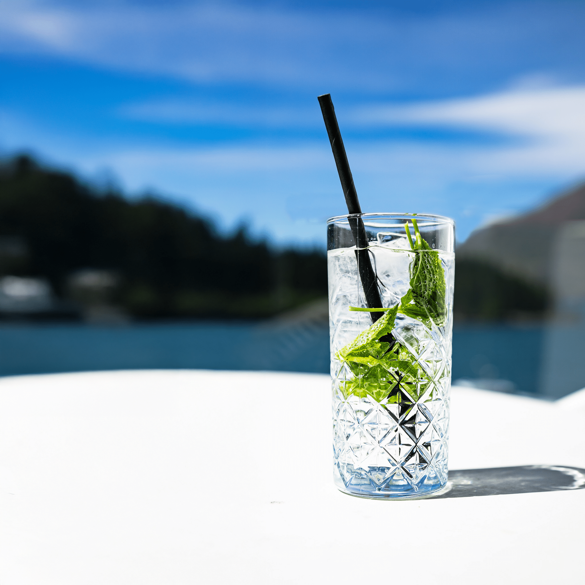 Cocktails at The Balcony Bar with mountain views